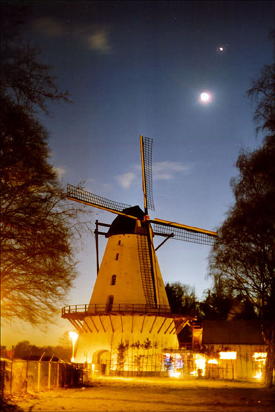 moon and venus with old mill